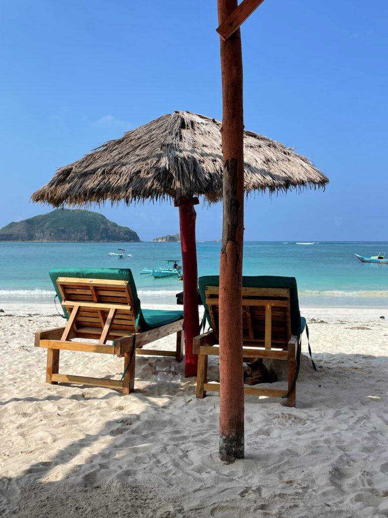 Lounge chairs on the beach with beautiful view Lombok Tanjung Aan