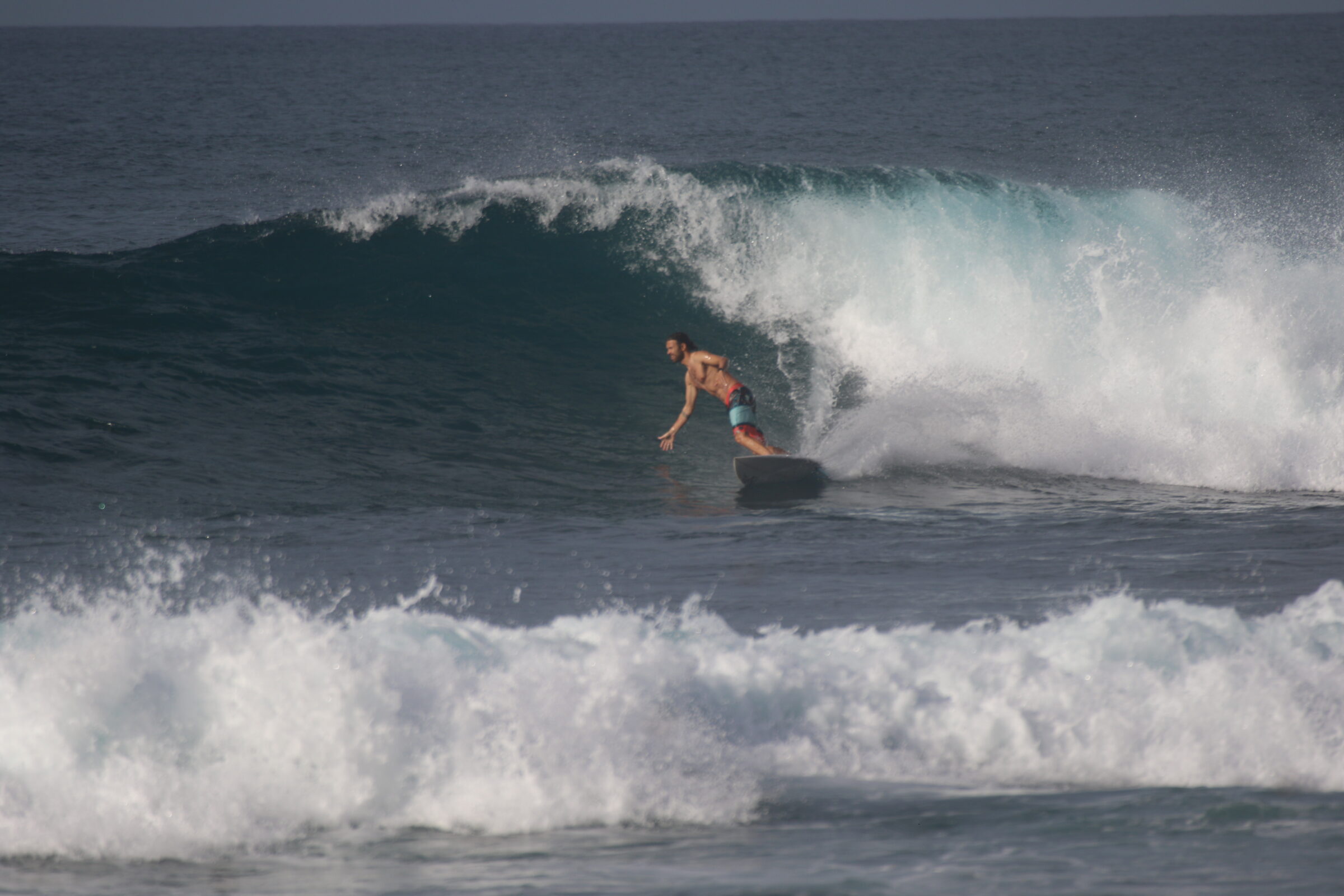Pascal thefreesurfer taking a wave at Mawi in Lombok