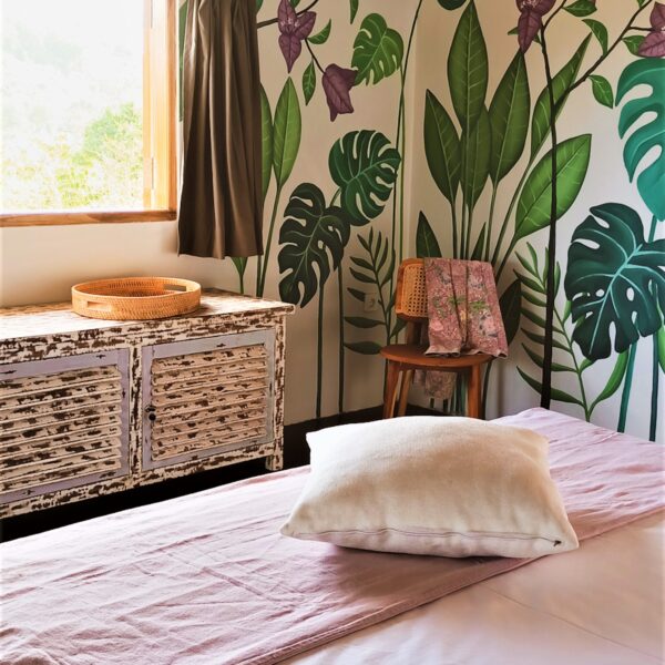 FabuLous Place Lombok surf villa purple bedroom with bougainvillea wall painting